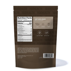 10X Health System vegan protein powder chocolate shake after-mix texture in a glass.