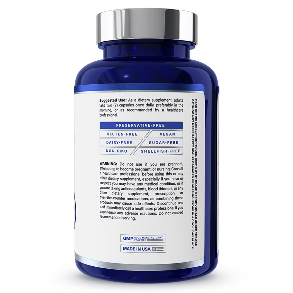MindMD packaging with glass of water on clean surface