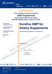Absonutrix Serrapeptase enzyme label close-up showing non-GMO and GMP.