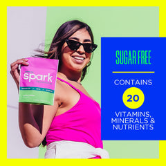 AdvoCare Spark powder dissolving into a glass for smooth energy.