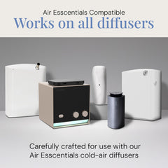 Air Esscentials Fresh Blue Aroma Oil bottle near diffuser for long-lasting ambiance.
