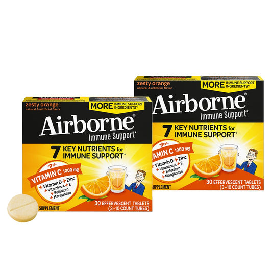 Airborne 1000mg vitamin C zinc tablets in zesty orange for daily immune support
