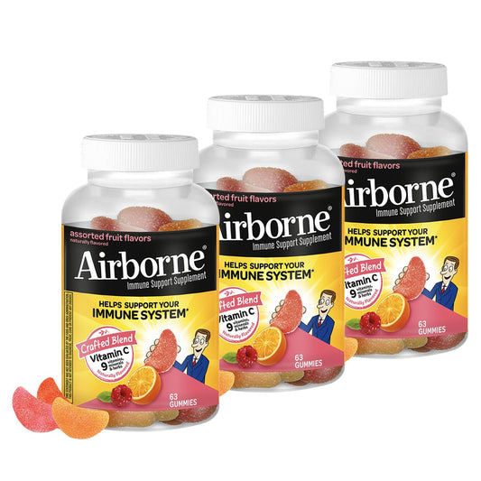 Airborne 750mg Vitamin C Gummies bottle pour shows convenient daily immune support on a shelf.