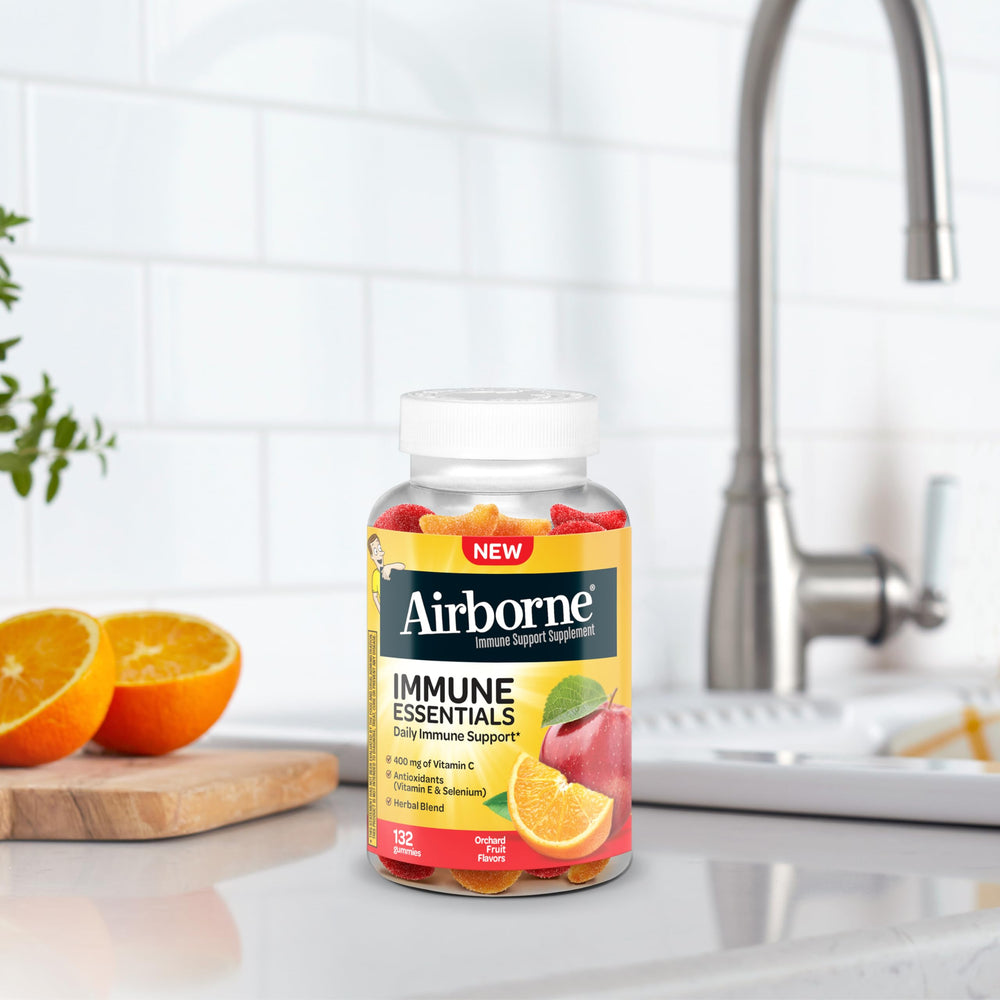 Airborne Orchard Fruit flavor gummies on kitchen counter