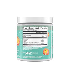 Alani Nu Juicy Peach powder scoop ready before training session.