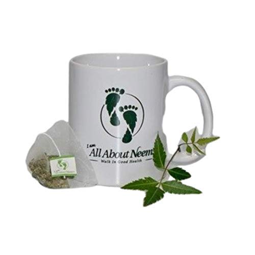 Hot water poured over Neem Queen tea bags showcasing organic, premium quality ingredients
