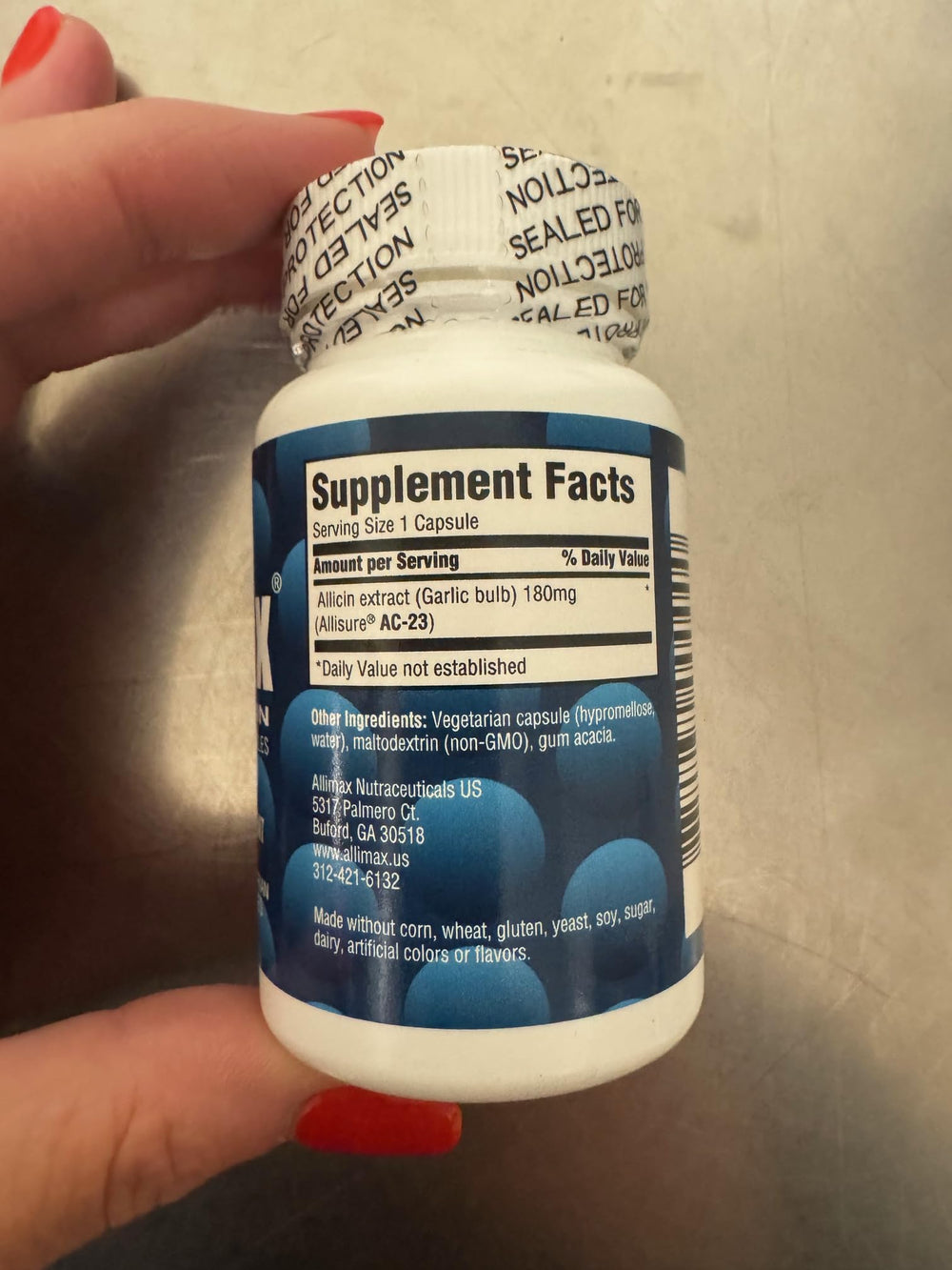 Allimax 180 mg capsules closeup highlights easy to swallow vegetarian capsules for daily use