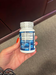 Allimax 180 mg label closeup emphasizes product identity and standardized garlic extract