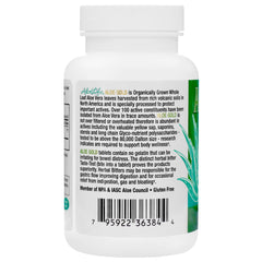 Aloe Life Aloe Gold tablets being poured for pre-meal digestive support.