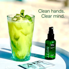 Travel-size ALŌH sanitizer bottle in compact design
