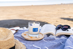 Aluminate Life cotton-wick candle delivering a steady, non-toxic burn.