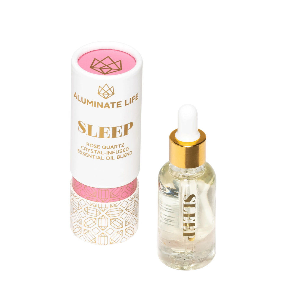 Aluminate Life Sleep oil vial with rose quartz infusion for aromatherapy.