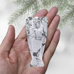 Amazing Gemstone Howlite Angel held in hand for portability and comfort