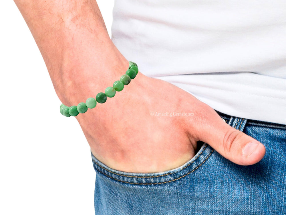 Man wearing Amazing Gemstone chrysoprase bracelet for versatile style.