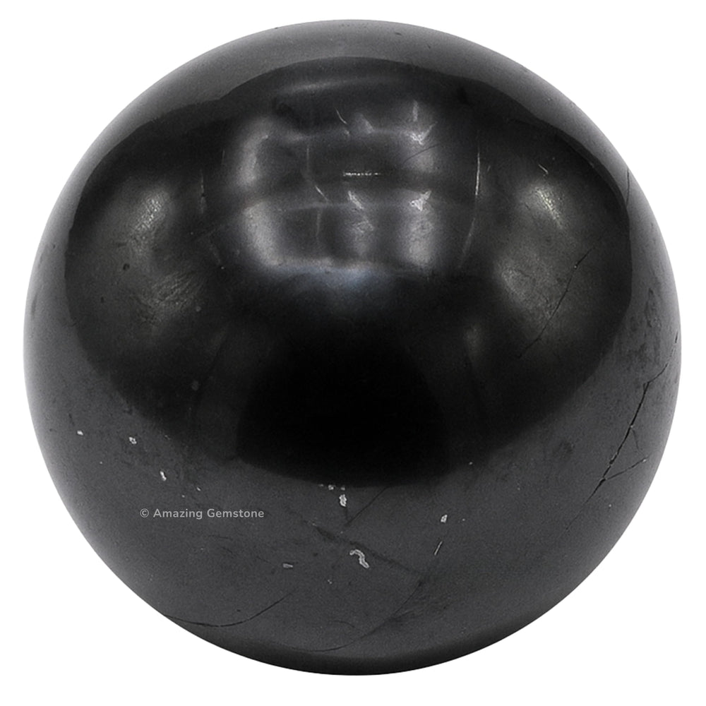 Closeup of Amazing Gemstone Shungite ball highlighting natural texture.