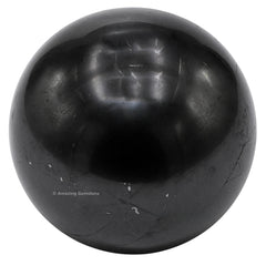 Closeup of Amazing Gemstone Shungite ball highlighting natural texture.