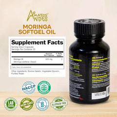 Pouring Amazon Andes Moringa Seed Oil Softgels from the bottle for easy daily use.