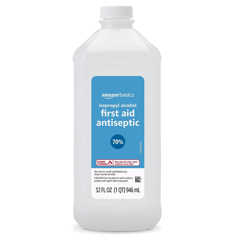 Amazon Basics first aid antiseptic bottle close-up for sanitizing scrapes.