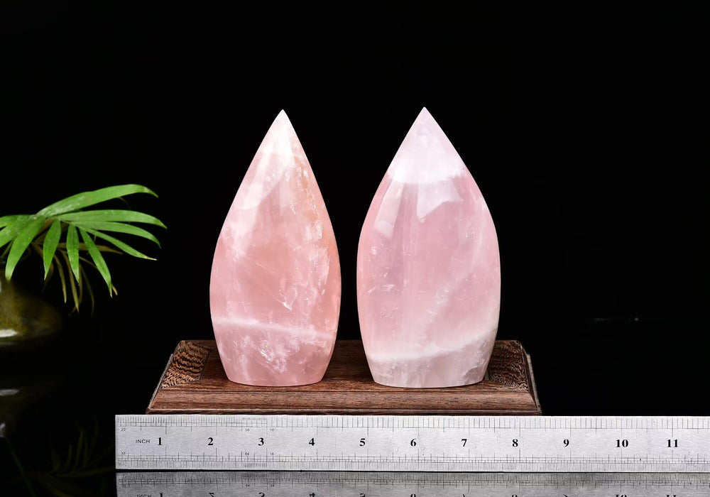 AMOYSTONE rose quartz tower 1.1-1.5 lbs front view on display.