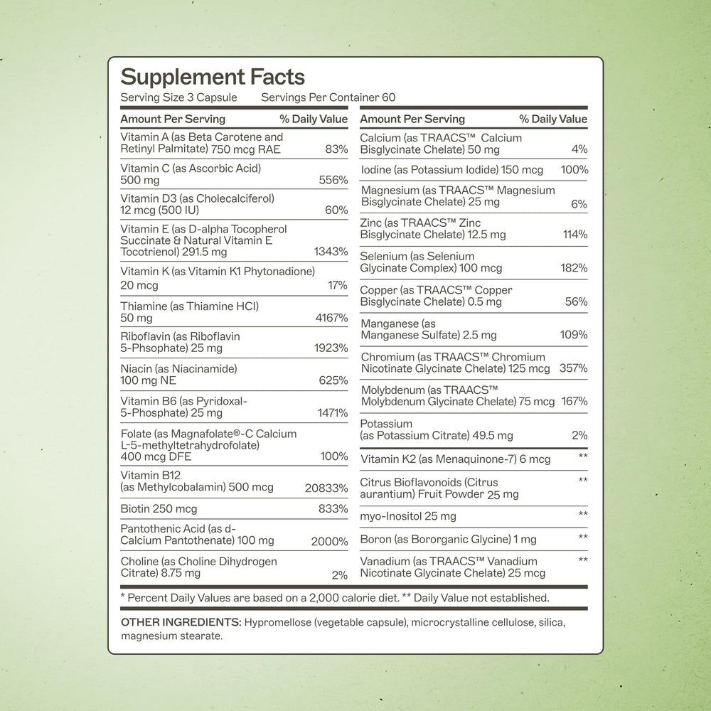 Close-up of capsules highlights iron-free and dairy-free formulation.