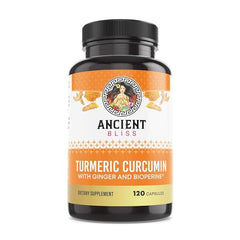 Ancient Bliss turmeric capsules close-up showing ginger and black pepper