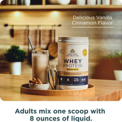 Ancient Nutrition bottle beside a glass, convenient on-the-go protein option.