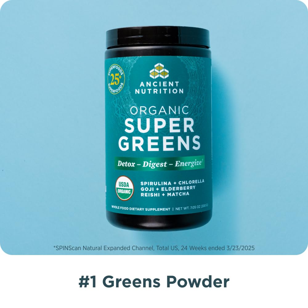 Ancient Nutrition Super Greens scoop beside water for quick mixing