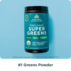 Ancient Nutrition Super Greens scoop beside water for quick mixing