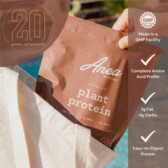 Anea Plant Protein Chocolate serving in a shaker cup for on-the-go use.