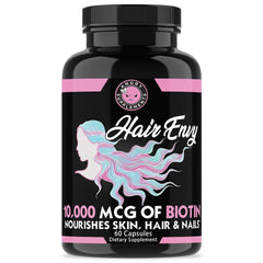 Hair Envy capsules close-up reveals biotin and keratin formula for hair support.