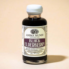 Closeup of Anima Mundi elderberry syrup bottle