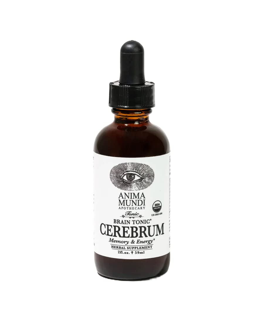 Anima Mundi Cerebrum bottle on wood inspires focused mental clarity during study.