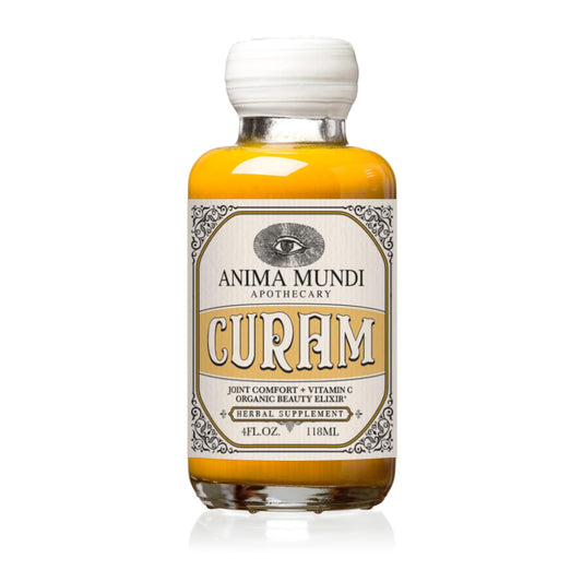 Anima Mundi Curam Elixir bottle pouring for daily antioxidant support.