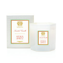 Antica Farmacista Aperol Spritz candle close-up highlights warm glow and citrus aroma.