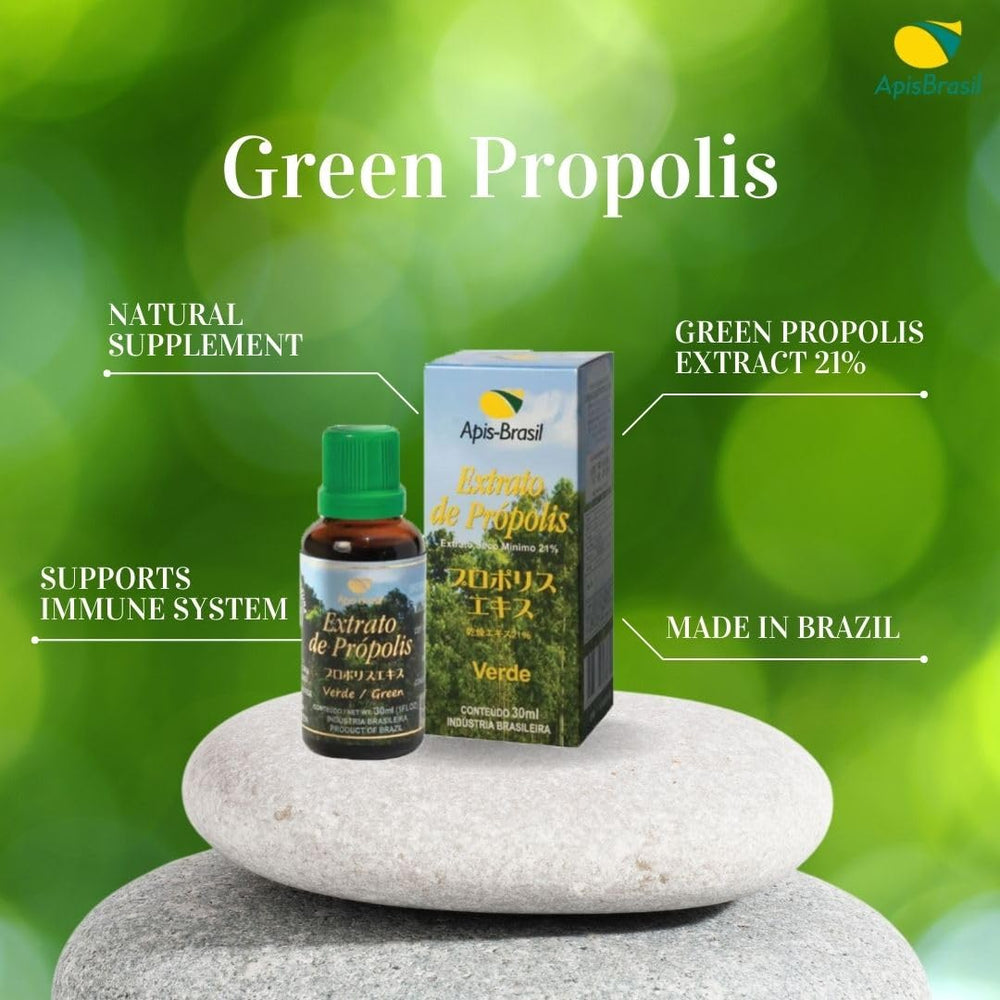 Drops dispensed into tea from ApisBrasil Green Propolis bottle