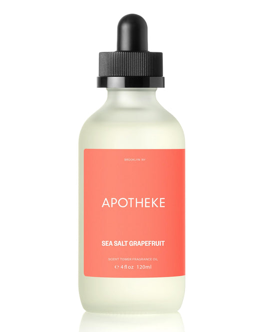 APOTHEKE Sea Salt Grapefruit refill bottle on a diffuser setup for long-lasting aroma.