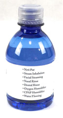 Pouring Aquapap water into a CPAP reservoir for clean use