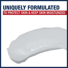 Hands applying Aquaphor Healing Ointment to soothe dry skin.