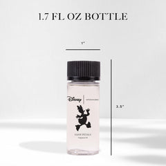 Lifestyle scene with diffuser emitting warm Aroma360 Daisy Duck fragrance.