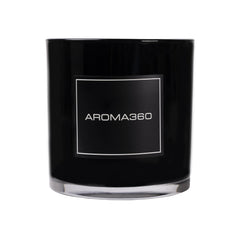 Aroma360 Escapade candle with lemon and bergamot top notes for a refreshing ambiance.
