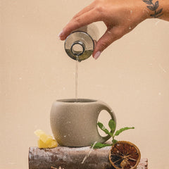AROMAPLAN Dark Tea teacup scene — suggests ritual and comforting moments.
