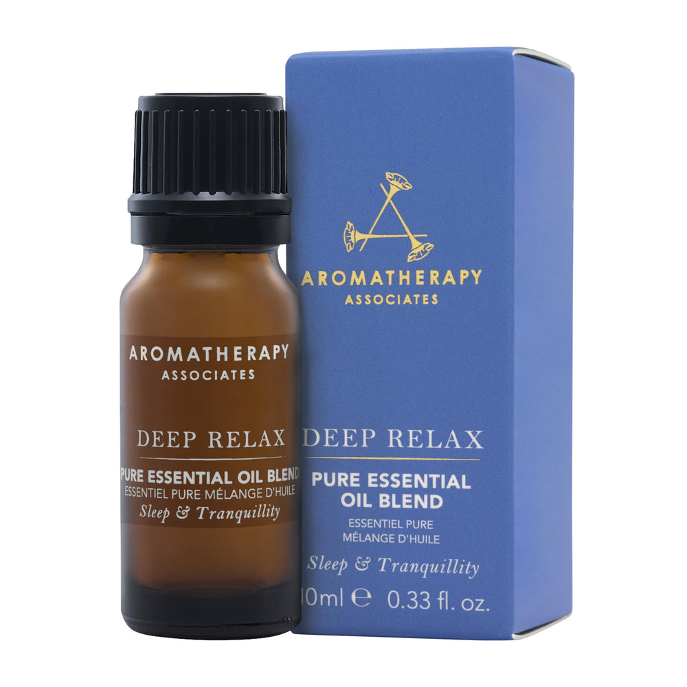 Aromatherapy Associates Deep Relax bottle-pour highlights vetivert and chamomile aroma for calm.