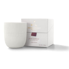Aromatherapy Associates Rose Candle in a ceramic holder for luxurious ambience.