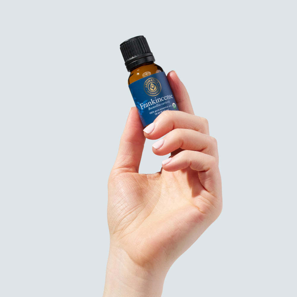 Aromatics International Frankincense Oil meditation ambiance with warm aroma.
