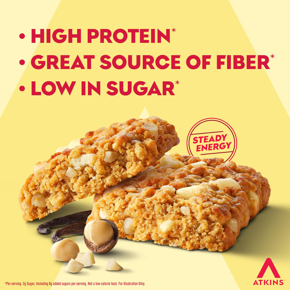 Atkins Vanilla Macadamia Bar resting on a desk ready for a snack