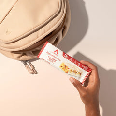 On-the-go moment with Atkins Strawberry Shortcake Bar snack
