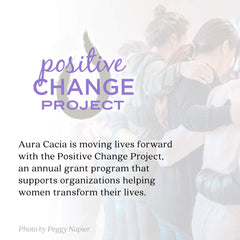 Aura Cacia lavender oil packaging highlighting purity and brand heritage.