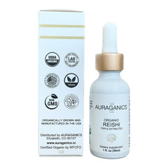 Pouring Auraganics tincture into warm tea for easy daily routine.