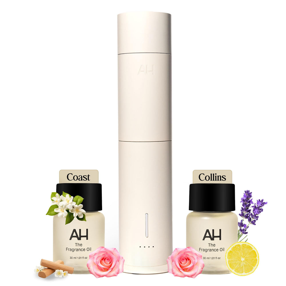 Aura House smart diffuser front view with sleek aluminum body for modern interiors.