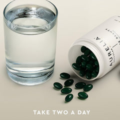 AURELIA Absolute Beauty bottle on shelf with clean design and modern branding